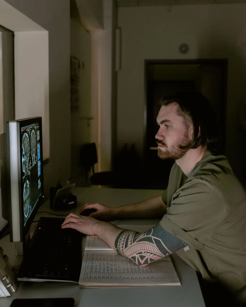 Radiologist reviewing images on a monitor