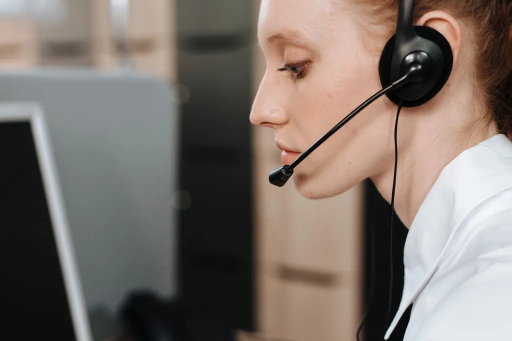 Staff member wearing a headset during a call